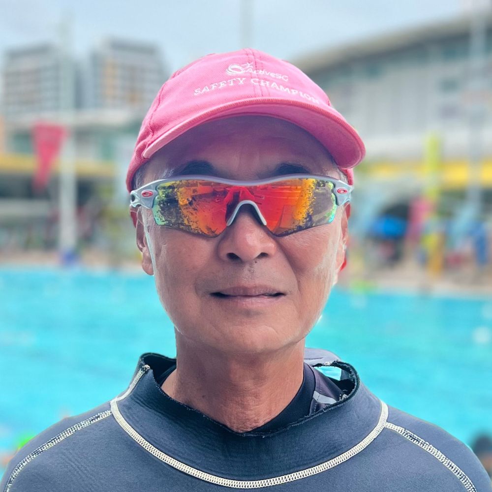 Coach Kelvin Chong beside the swimming pool at Singapore Swimming Academy